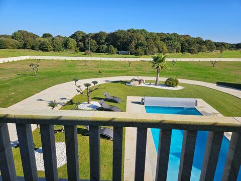 villa with waterfront pool