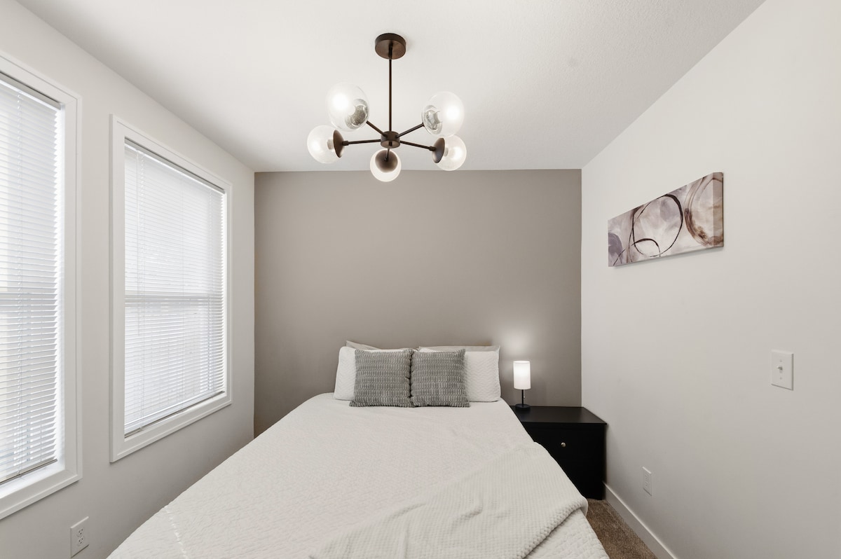 Relax in the downstairs bedroom and enjoy a quiet, restful night