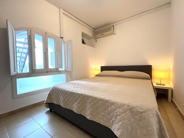 The second bedroom offers a king size bed with bed-side tables, and a wardrobe with hanging space, shelves, and full length mirror. A new air-conditioning unit has been installed August 2024.