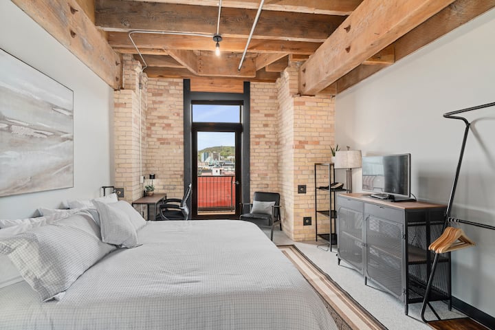 The master bedroom has access to your own private terrace with views of the William A. Irvin and the Duluth skyline!