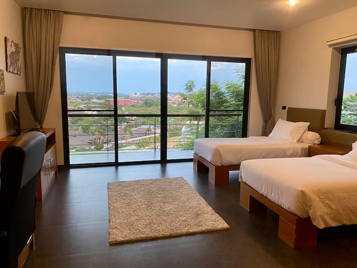 Large bedroom with a few