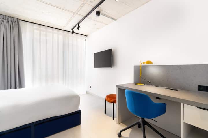 Workspace evidence from La Fabrica &Co, Studio with double bed