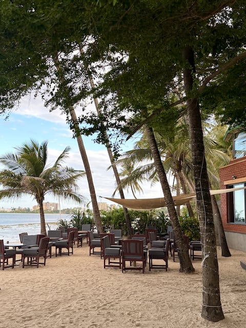 Beachfront 2BR Retreat | Pool • Restaurant & Café
