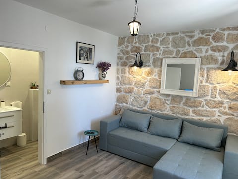 Successful Airbnb property: Stone house with heated pool, unique view in Grad Rab