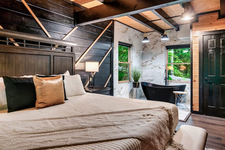 On Level 1 Master Suite with ensuite - Soaking Tub with Marble Backdrop