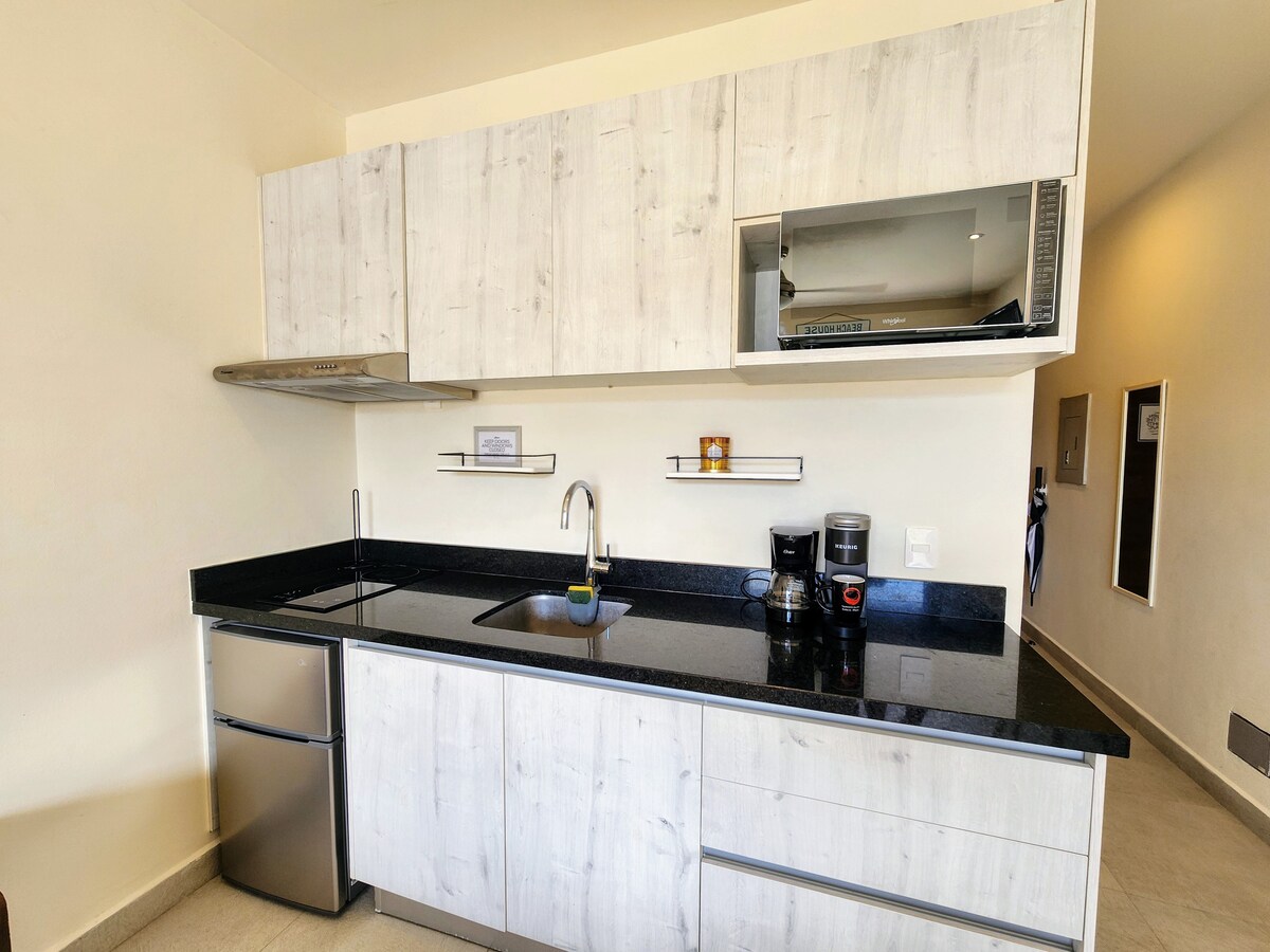 Top Airbnb: Waterfront Loft with Pool & Marina Views en Puerto Aventuras