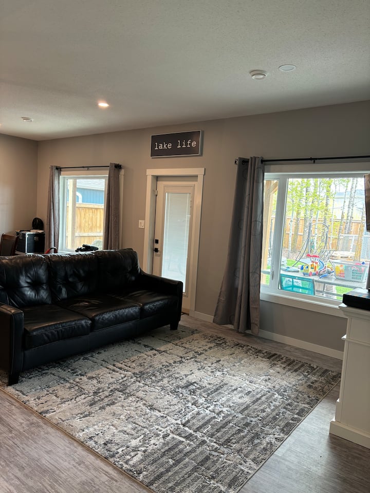 Skip To The Beach!
Ground Level 2 Bdrm Apt & Yard - Sylvan Lake