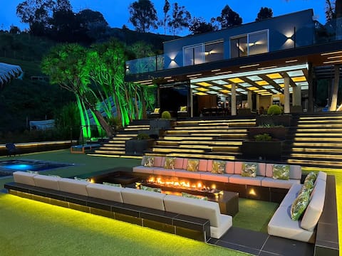exclusive villa in guatape with lake and heliport.