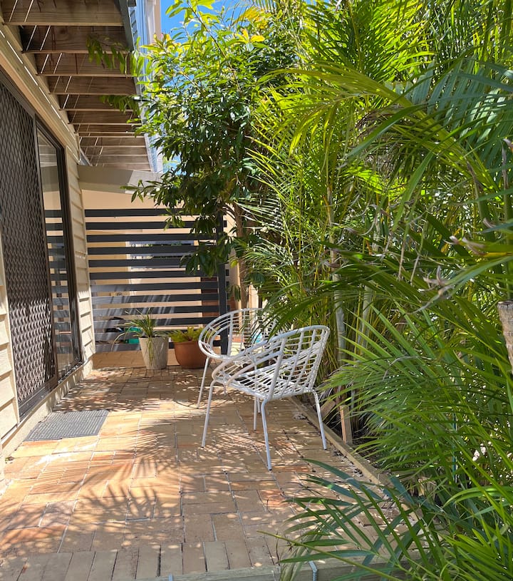 Small tropical garden adjoining bedroom to sit and ponder