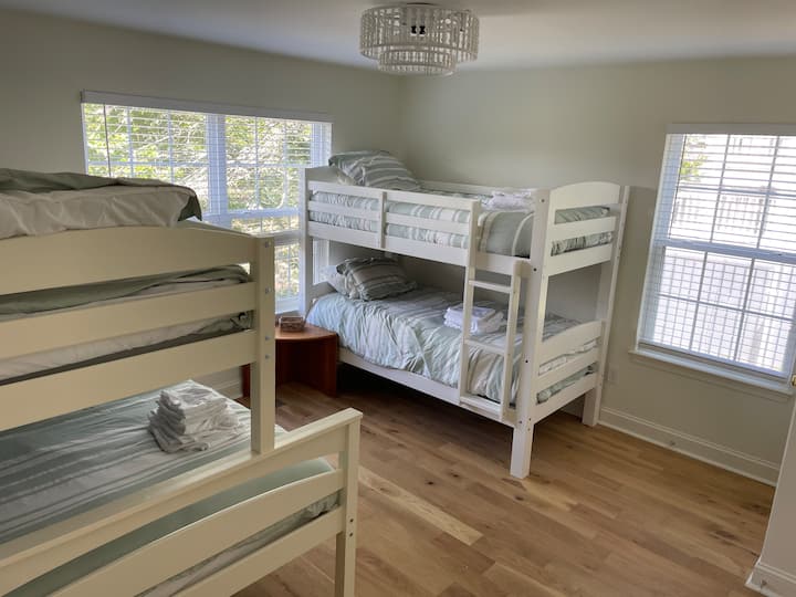 Twin over full and twin over twin, share Jack & Jill with bedroom 5 (with twin/work space)