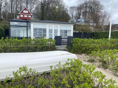 Cottage with a view of the water