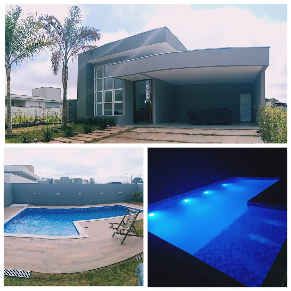 The exterior of a modern house is portrayed, featuring large glass windows and a covered outdoor seating area. A well-maintained garden with palm trees is visible, along with a swimming pool that is illuminated with soft blue lights, creating a serene atmosphere.