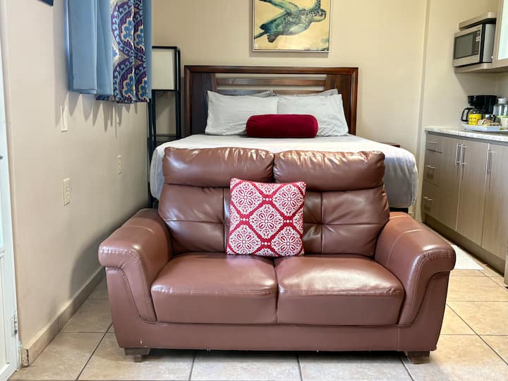 Queen bed and love seat for relaxing!