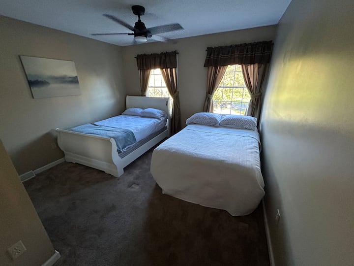 This bedroom has 2 double beds!