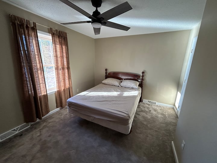 This bedroom has 1 Queen bed & a beautiful water view!