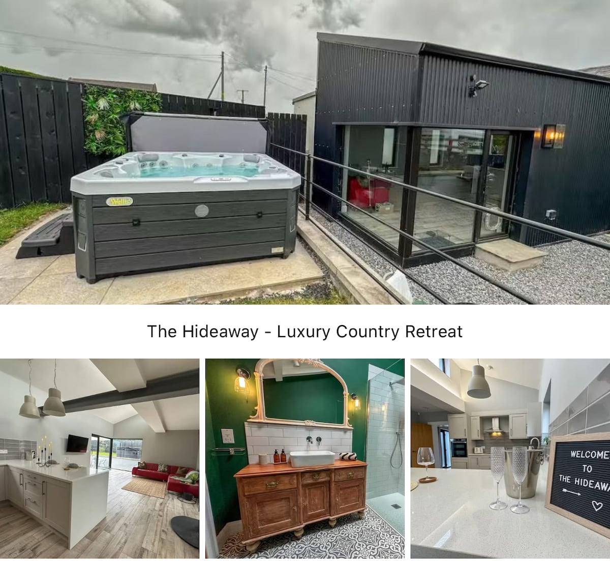 A hot tub is placed on a gravel patio, surrounded by black fencing and a modern building. The exterior features a sleek design with large glass doors, offering a view of the inviting indoor space.