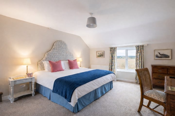 Light and spacious master bedroom