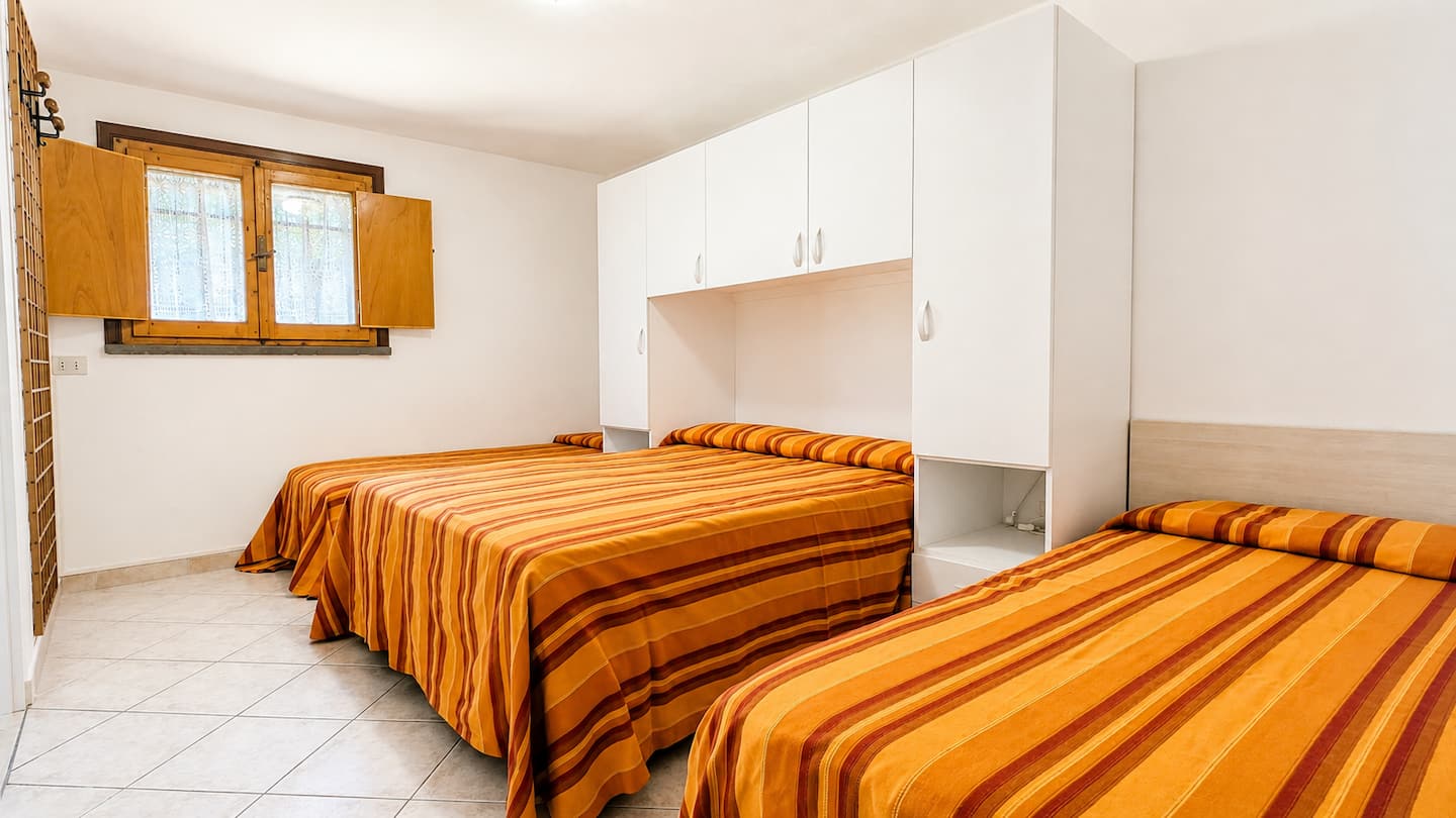 Camera da letto dell'appartamento Pineta 3 a Pinarella
