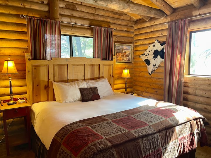 Master bedroom with king bed, smart rv, ceiling fan, central heat and AC and attached full bathroom 