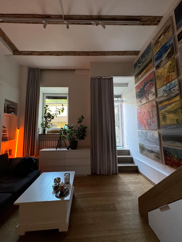 On the right side, you'll find the entrance door. And just like that, you're already in my apartment!