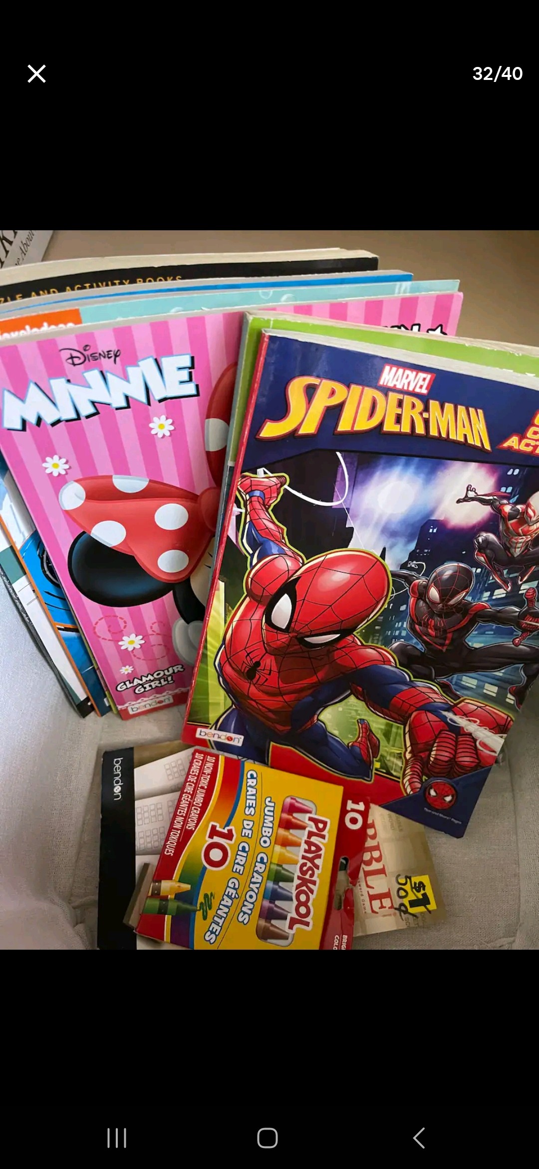 A collection of children's activity books is displayed, featuring colorful covers. Notable titles include a Disney Minnie Mouse book and a Marvel Spider-Man adventure. Various other educational materials are also included, with bright colors and playful illustrations enhancing the appeal for young readers.