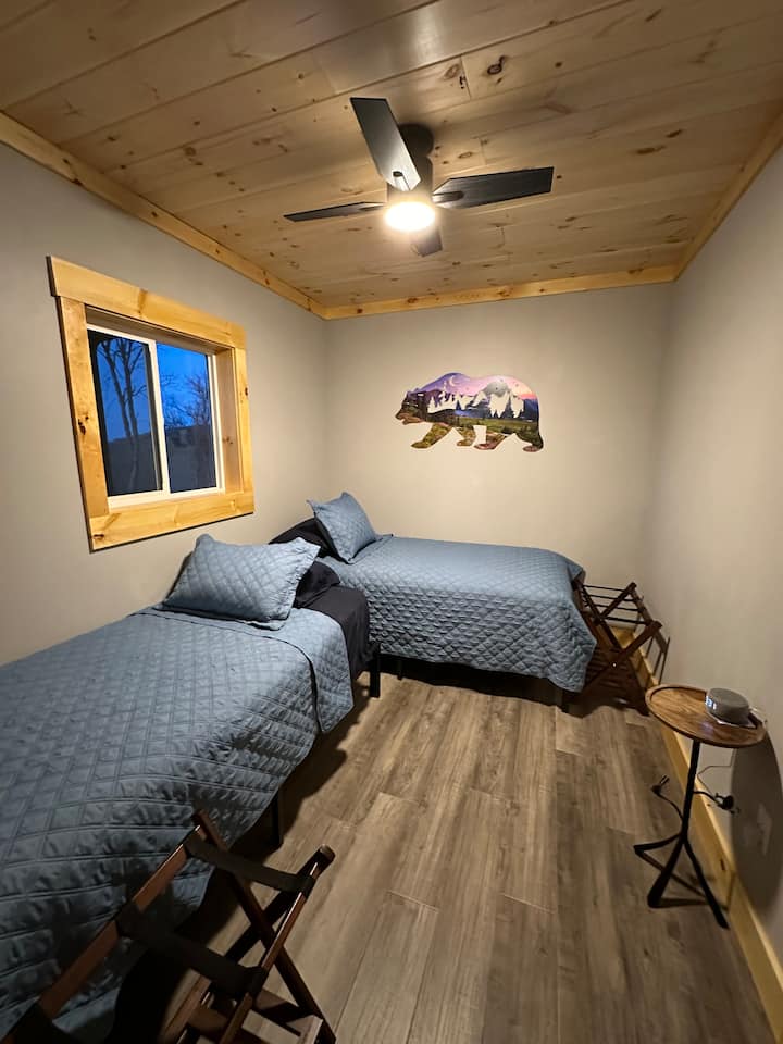 Basement bedroom with two twin XL Beds