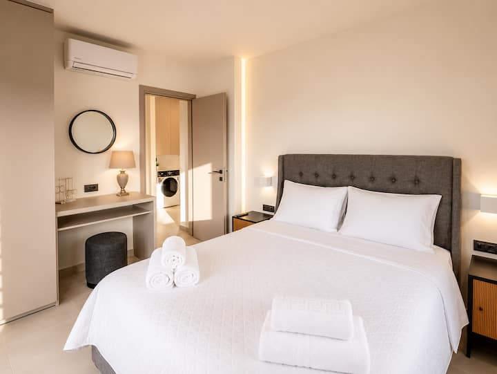 First Floor - Bedroom 2 with queen-size bed and balcony with beautiful sea views