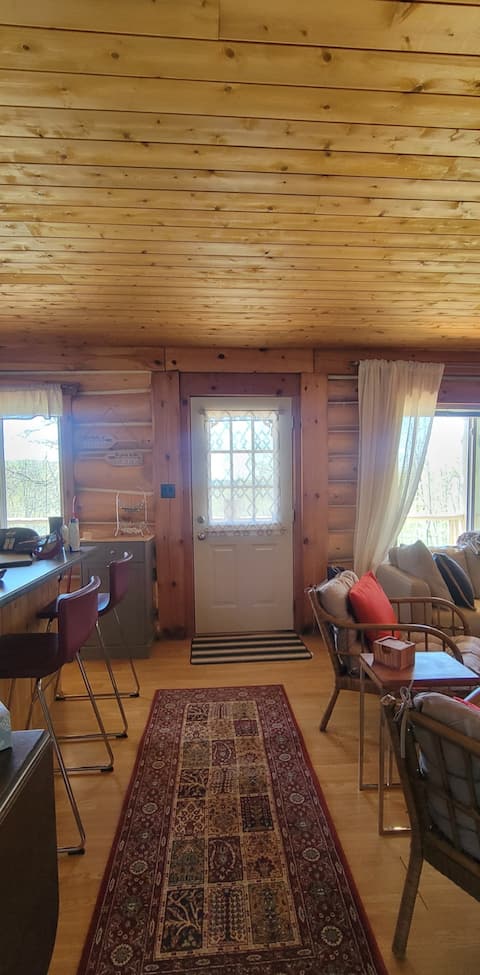 Popular Airbnb listing: "La Rústica" Log Cabin/2 kayaks & paddle board! in North Frontenac