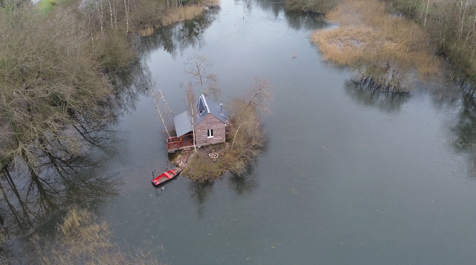 A cabin on its own island in a pond, Sury-aux-Bois, Loiret, France, photo 2 of 10