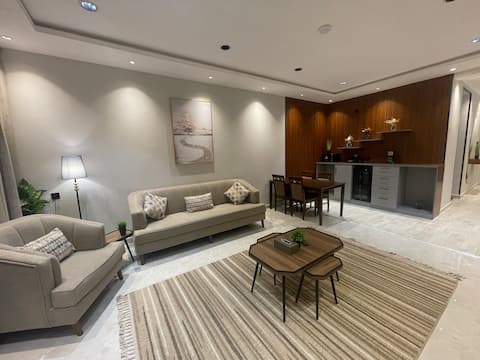 Hotel apartment with bedroom, living room, and coffee corner