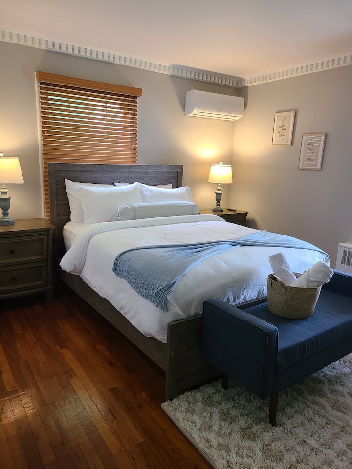 Main floor bedroom with smart TV and complimentary Netflix