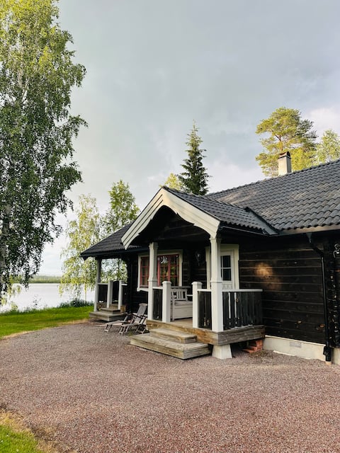 Log cabin by the river