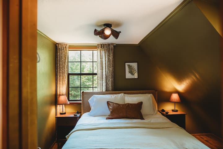 The green bedroom upstairs is inspired by the unique fern covered rainforest floor of the Olympic peninsula.
