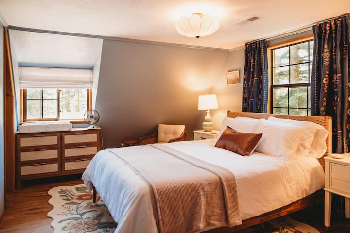 The blue bedroom upstairs is inspired by the local landscape of Sequim, know for its floral festivities and being the Lavender Capital of North America!