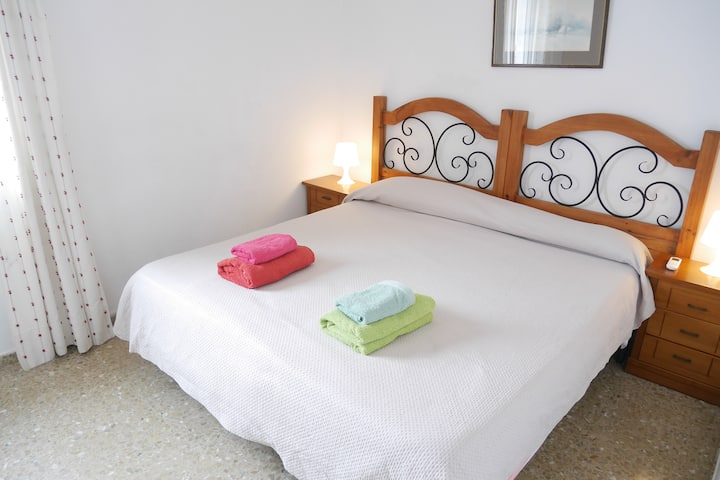 Master bedroom with twin beds (or made up as a double bed as shown), air conditioning and en-suite shower room