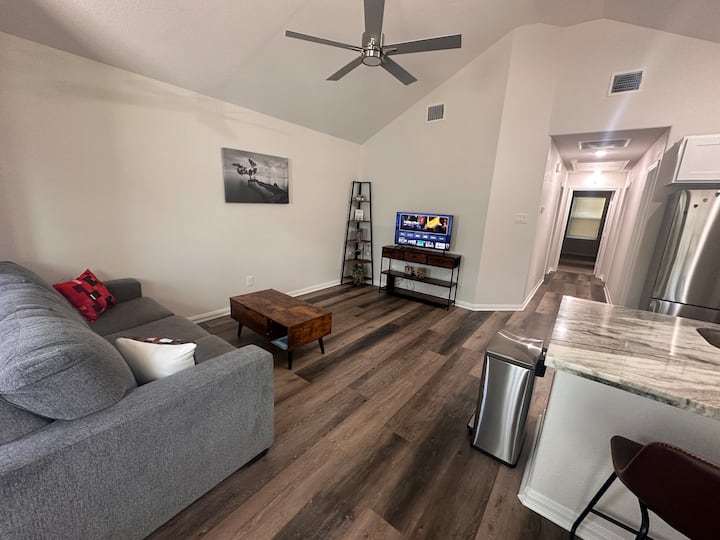 Cozy living room with a comfortable queen sofa bed, perfect for extra guests.