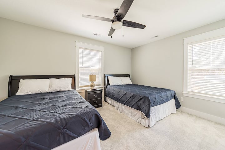 Peaceful suite with 2 full-sized beds designed for restful nights after a day of Outer Banks adventures