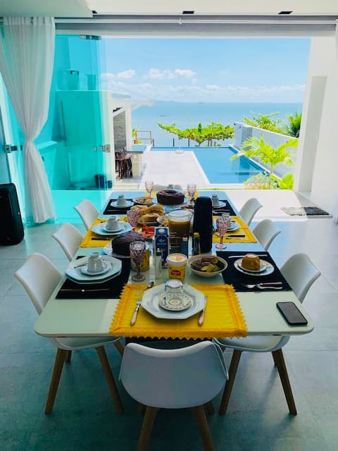 Seaside paradise with your feet in the sand.