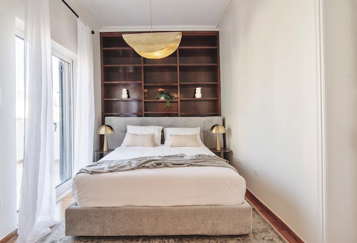 Warm wood tones and golden accents create a welcoming, sophisticated retreat.