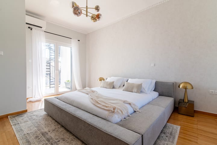 Morning light unfolds gently across linen, brass, and calm.”