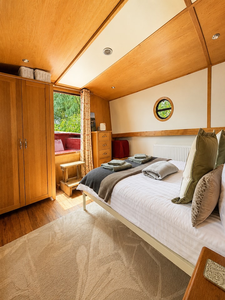 There's plenty of space and storage in the main bedroom with French doors leading onto the outdoor seating area.