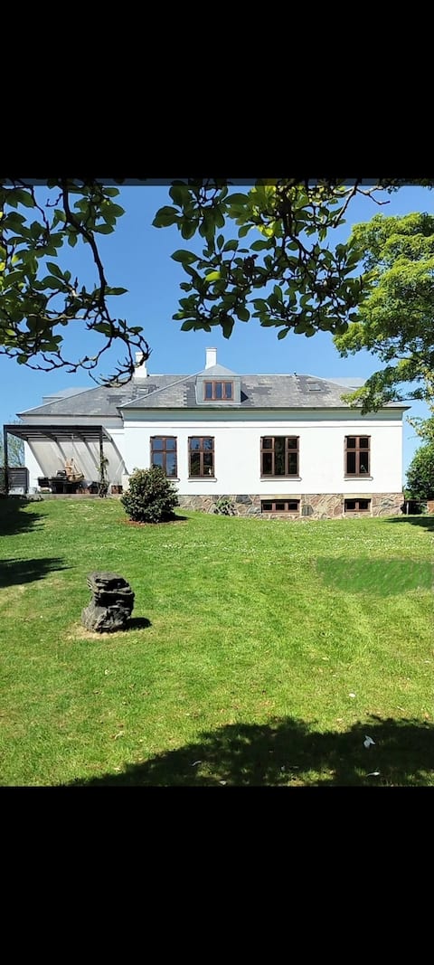 The Old Medical Center in Tranebjerg with an outdoor pool