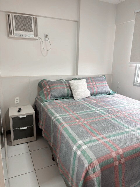 ห้องพักพร้อมเตียงคู่และเครื่องปรับอากาศ