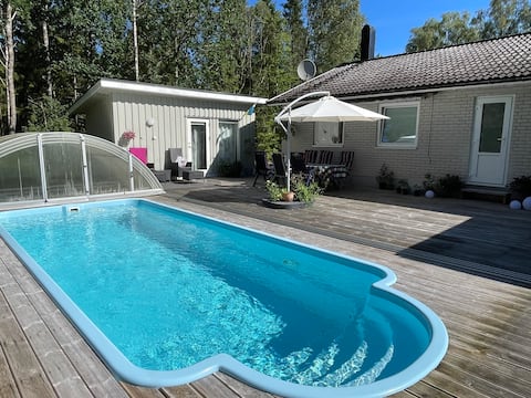 House with pool and fireplace in Vittsjö