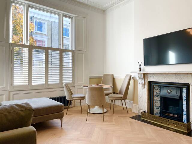 Raised ground floor two-bedroom flat with a garden