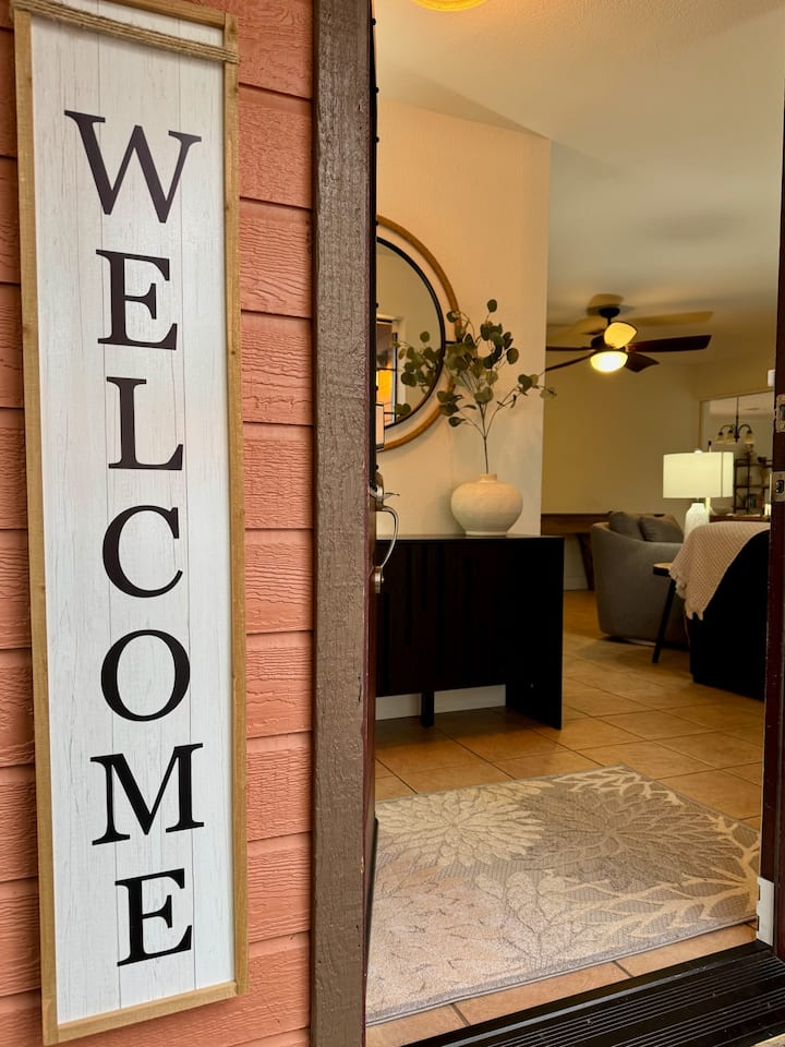 Entrance Hall: Step inside to discover a stylish blend of warmth and modern elegance!