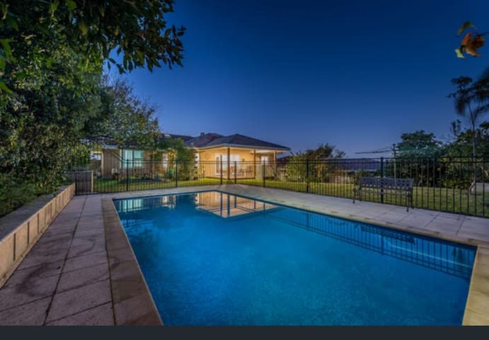 City views, cosy home with pool gallery image 2