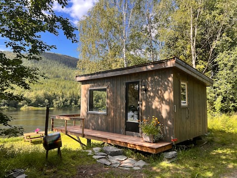 Unique minihouse by The riverbank
