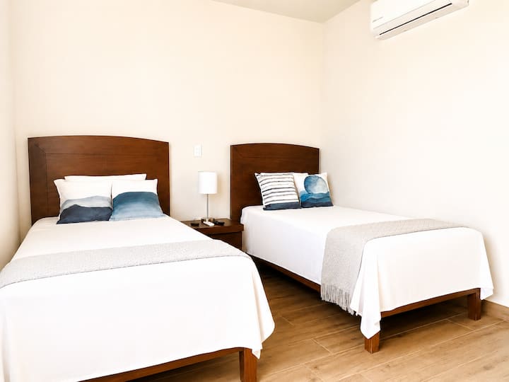2 single beds, air conditioning available