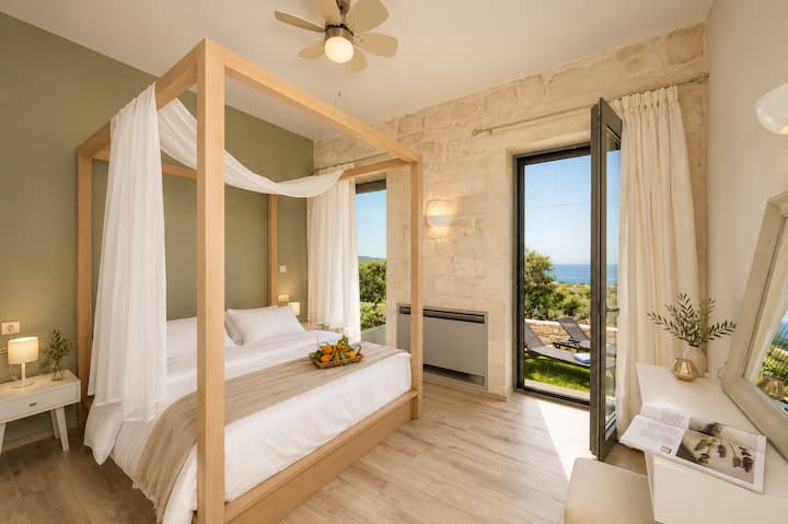 Ground Floor - Bedroom 1 with queen-size bed,  en-suite bathroom and pool access
